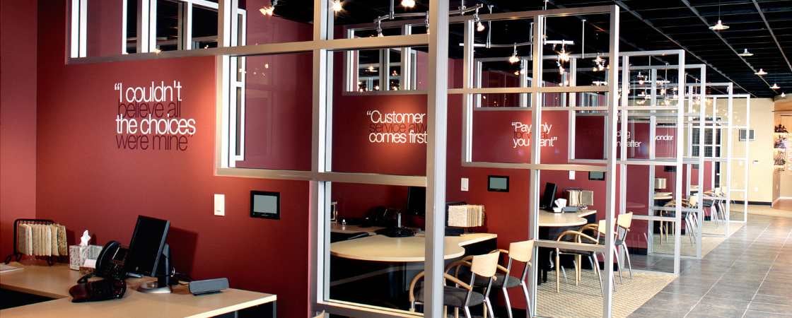 Cool coworking space with red walls and flourescent words